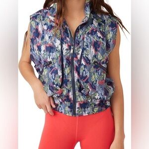Free People Movement Off the Grid Printed Vest in supernova floral w/HIDDEN HOOD